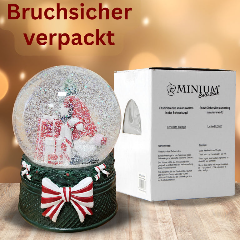 Nostalgische Schneekugel Wichtel rot auf Weihnachtsdekor grün 100 mm Durchmesser mit Spieluhr