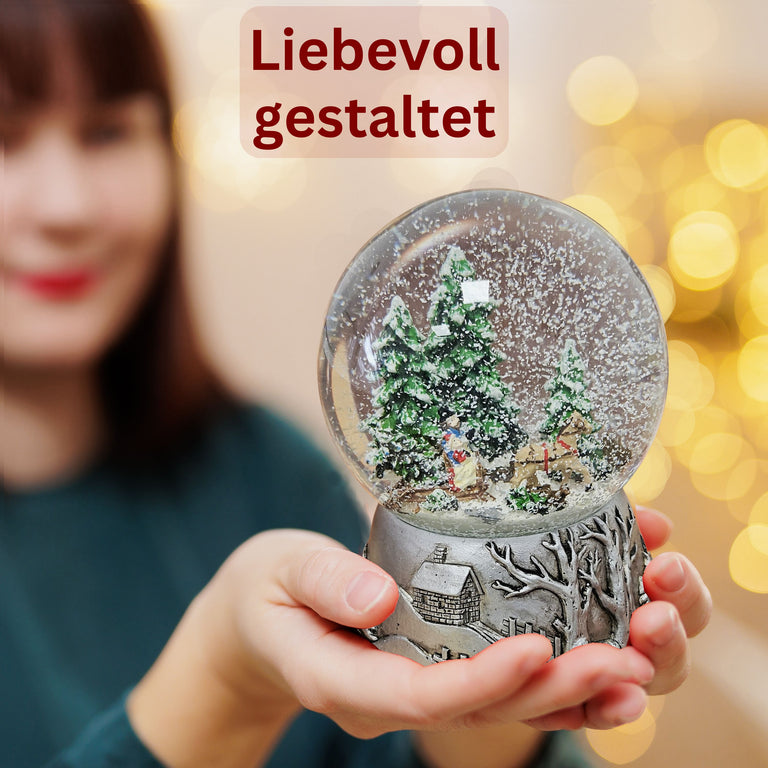Nostalgische Schneekugel Schlittenfahrt auf Silber Landschaft 100 mm Durchmesser mit Spieluhr