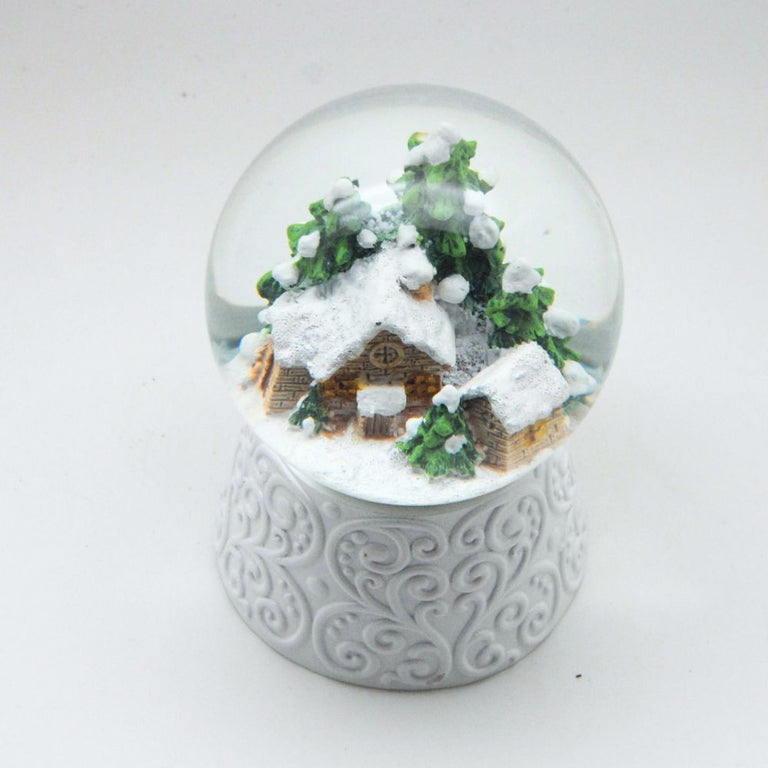 Edle Schneekugel Hüttenzauber Berghütte auf weißem Ornamentsockel 100 mm Durchmesser mit Spieluhr - Schneekugelhaus