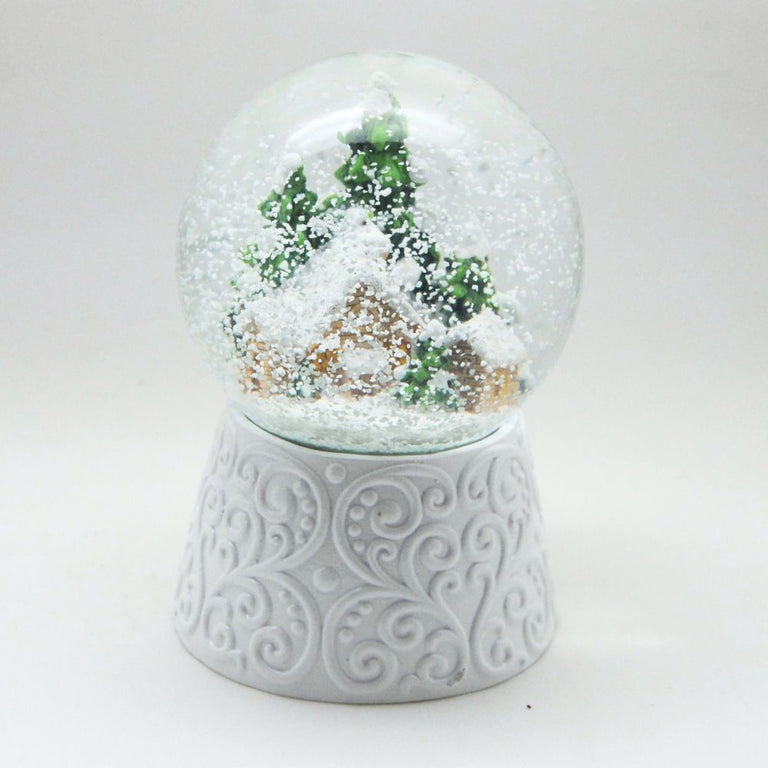 Edle Schneekugel Hüttenzauber Berghütte auf weißem Ornamentsockel 100 mm Durchmesser mit Spieluhr - Schneekugelhaus