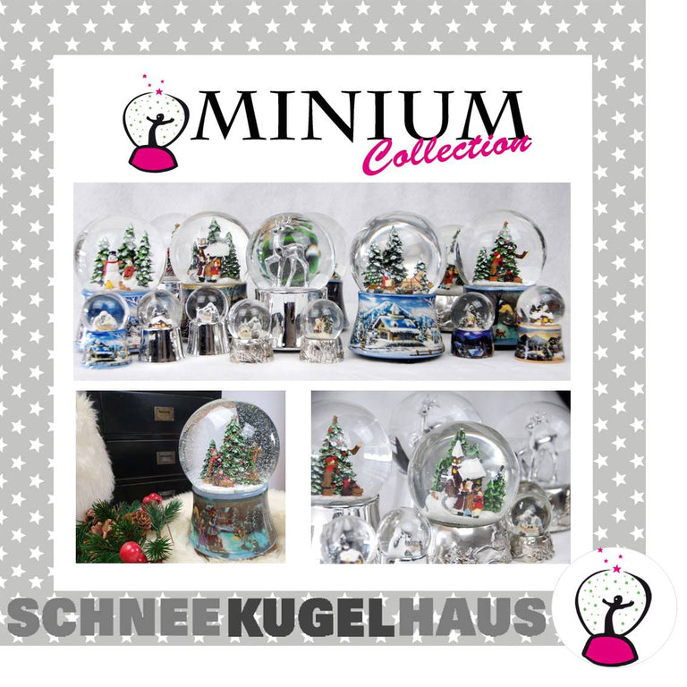 Schneekugel Engel rot mit Schale gold auf Sockel gold mit Sternen mit Spieluhr - Schneekugelhaus